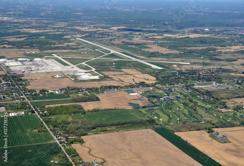 aerial view of the Hamilton Airport with partial view of Mount Hope and surrounding farmland and golf course 