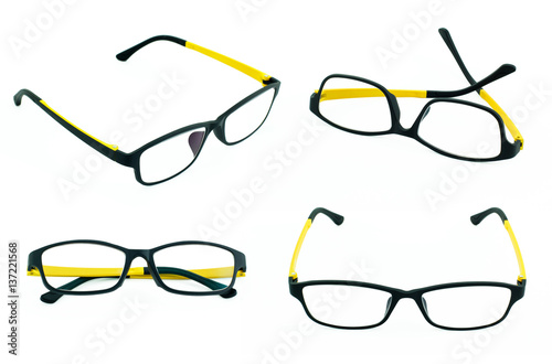 Set of black and yellow light weight eyeglasses on white background