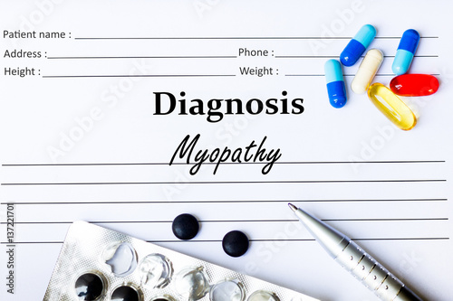 Myopathy - Diagnosis written on a piece of white paper with medication and Pills