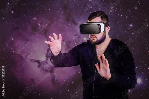 Man Wearing Virtual Reality Headset Playing Game