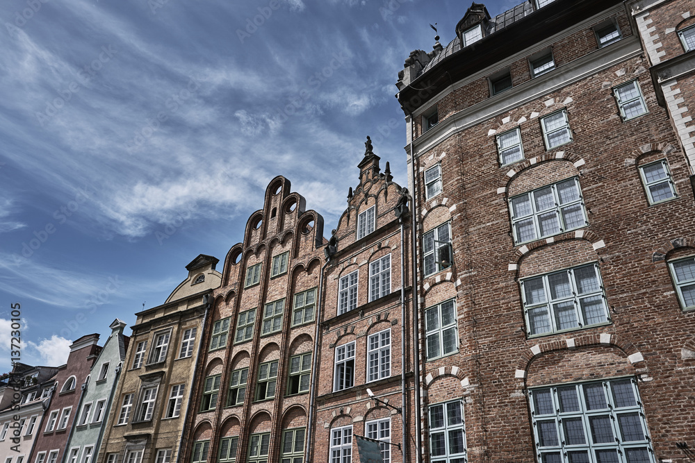Facade historic tenement houses building in Gdansk.