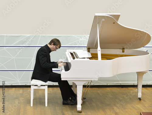 Photo Inspiration. Pianist plays fast music