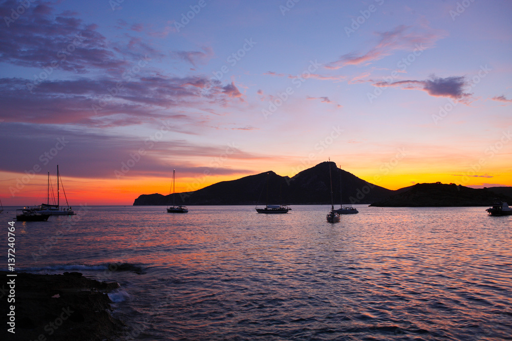 Silhouetted view of Dragonera Island at sunset, Majorca, Spain Silhouetted view of Dragonera Island at sunset, Majorca, Spain