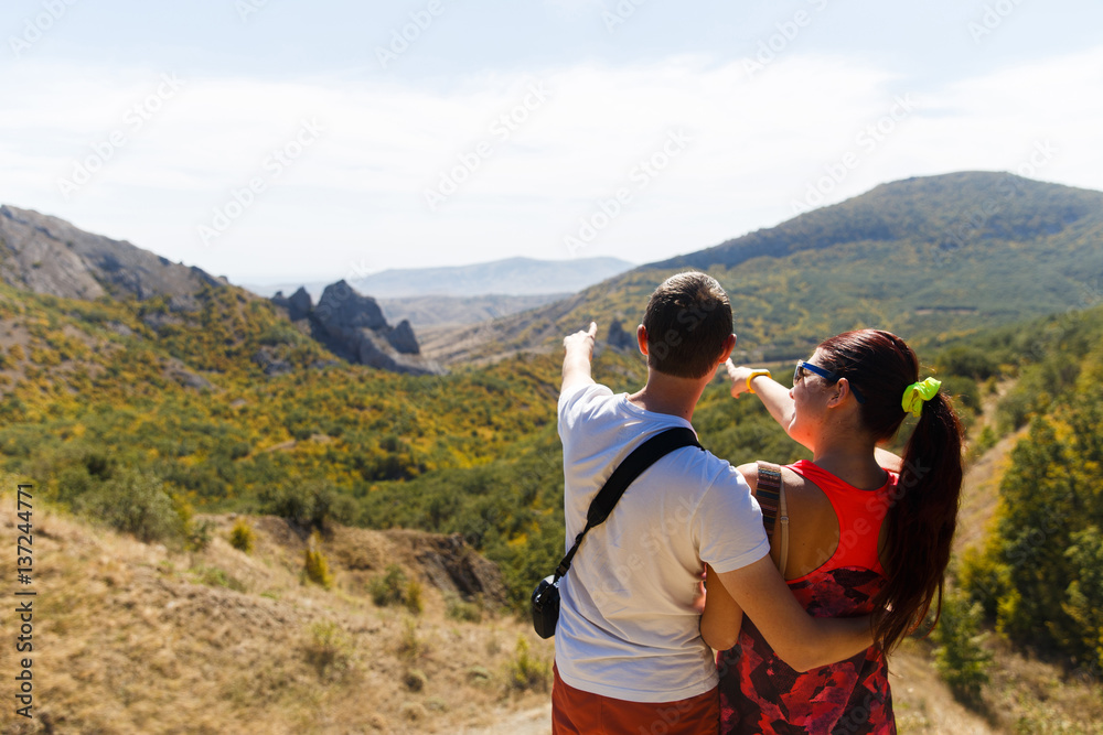 Family admires beautiful mountain landscape