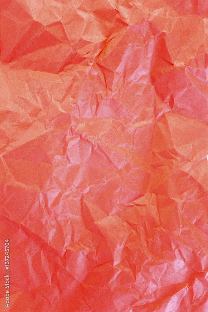 Fototapeta premium Crumpled red paper background