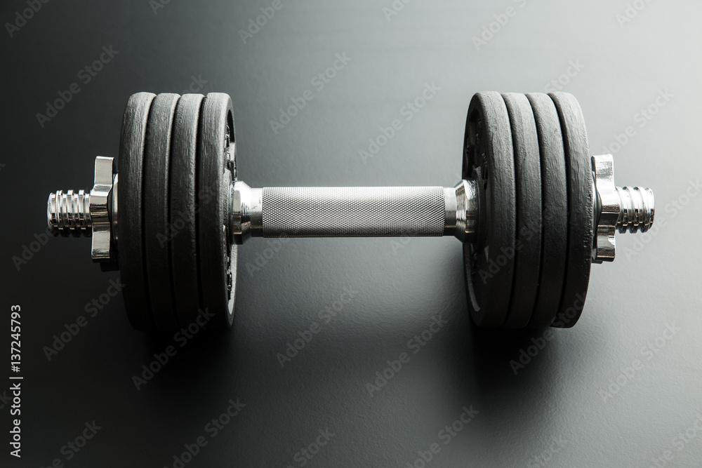 The metal dumbbell.