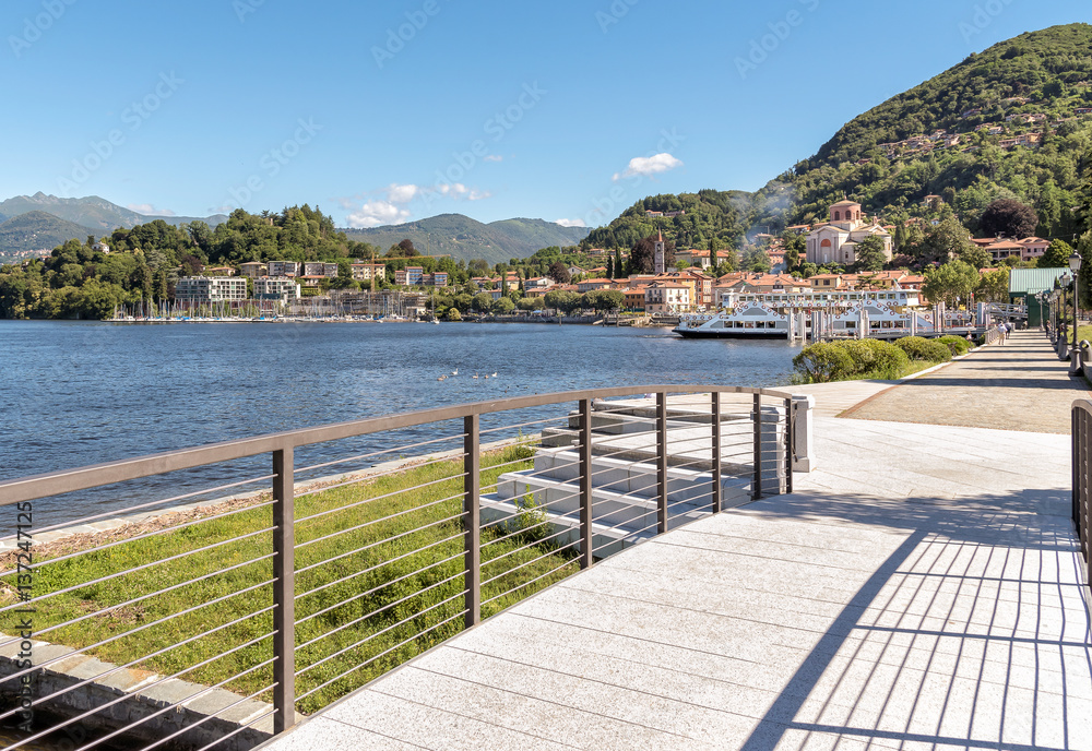Naklejka premium Laveno Mombello, located in an natural gulf on the east bank of Lake Maggiore in province of Varese, Italy.