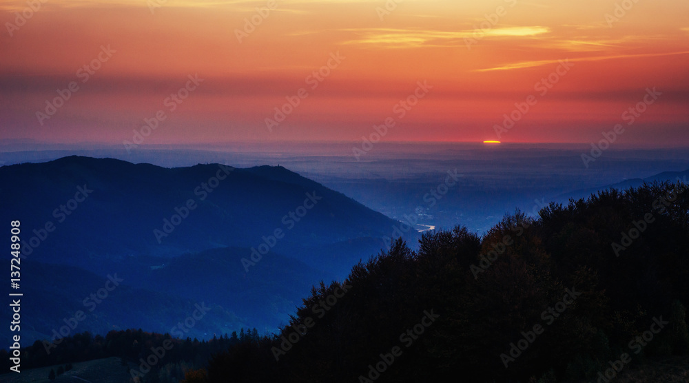 colorful sky with sun background in mountains. sunset, sunrise. 