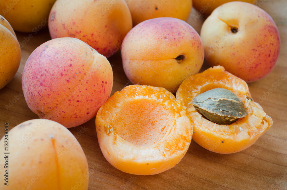Fresh Organic Apricot on Rustic Background.