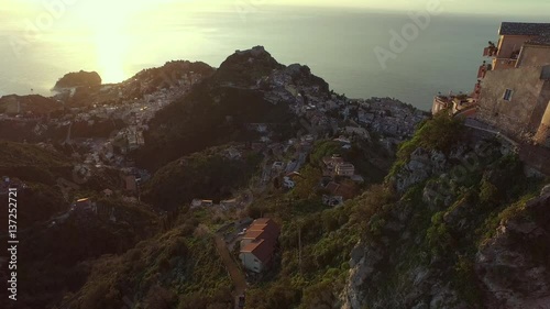Flight from the hill towards the sea in a small town in Sicily
Drone of Taormina