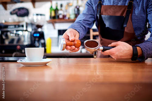 Fototapeta Naklejka Na Ścianę i Meble -  Hands bartender baristas make coffee cocoa cappuccino.