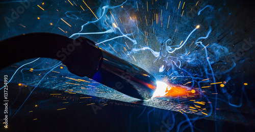 Industrial steel welder in factory technical,