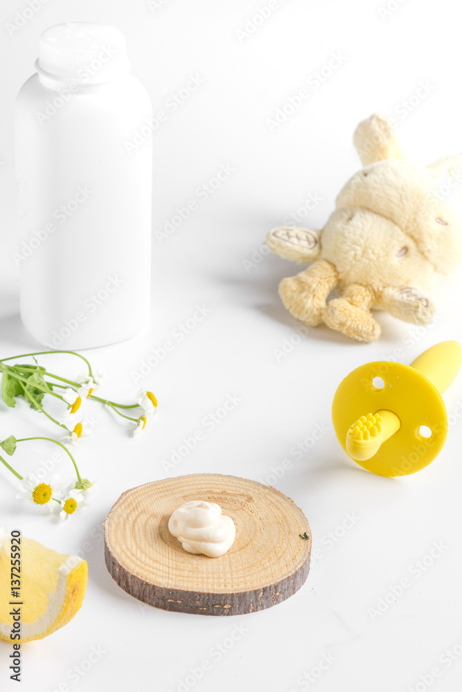 natural organic cosmetics with herbs for baby on white background natural organic cosmetics with herbs for baby on white background