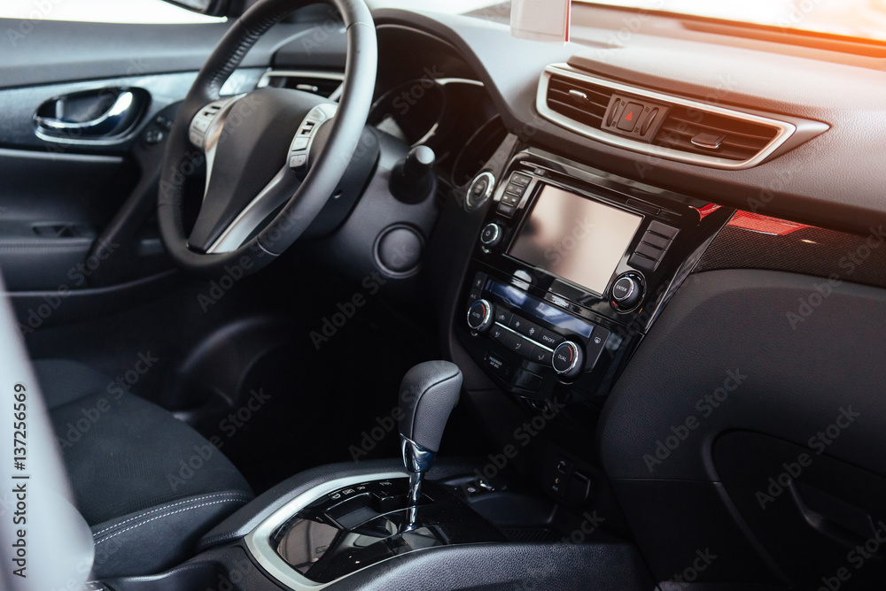 Modern car interior dashboard and steering wheel