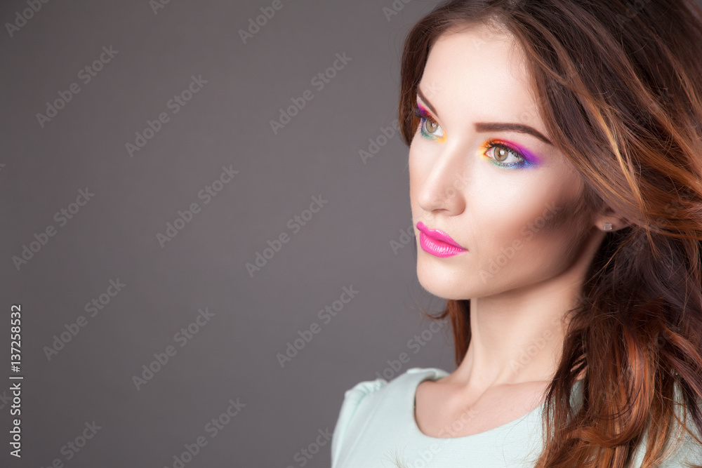 Beautiful young woman with vivid makeup Beautiful young woman with vivid makeup