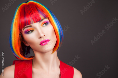 beautiful woman wearing colorful wig