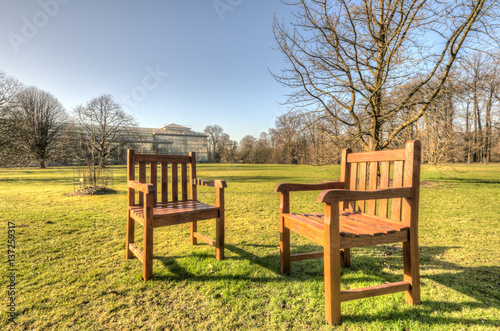 Two chairs in a sunny day on the field
