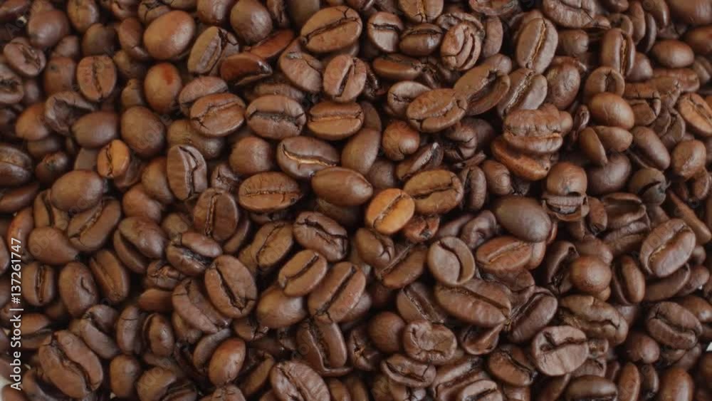 coffee beans on rotating stand closeup, slow motion coffee beans on rotating stand closeup, slow motion