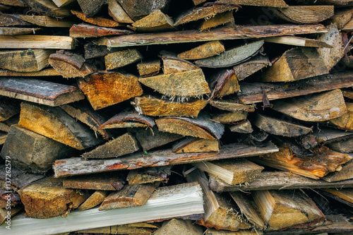 Natural wooden background, closeup of chopped firewood