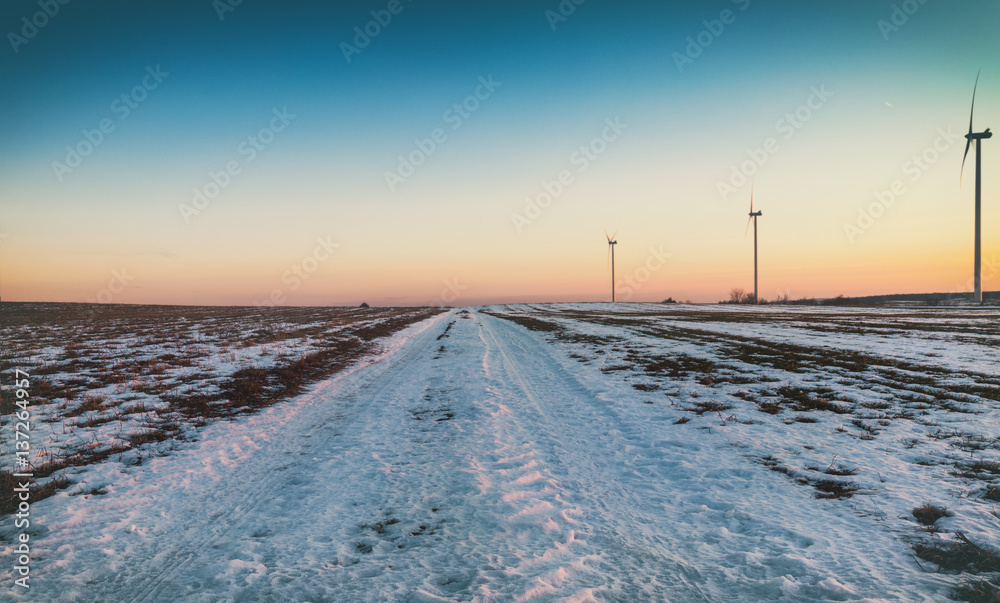 Wind-Power Farm in Rural Wintry Landscape