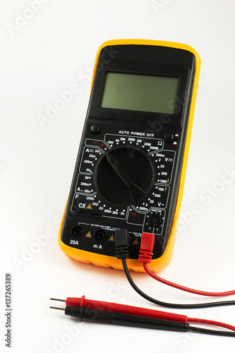 Digital multimeter with probes on the white background