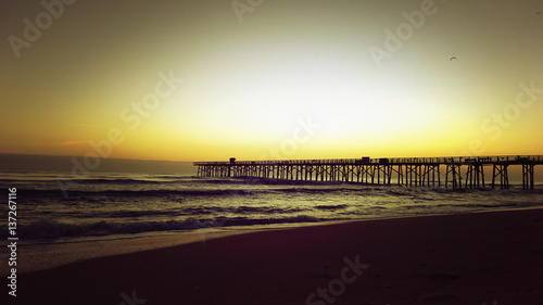 Sunshine at the Beach with Pierand Warm Sky photo