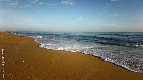 Beach with Sea Shore Line and Warm Sand © LogoStockimages