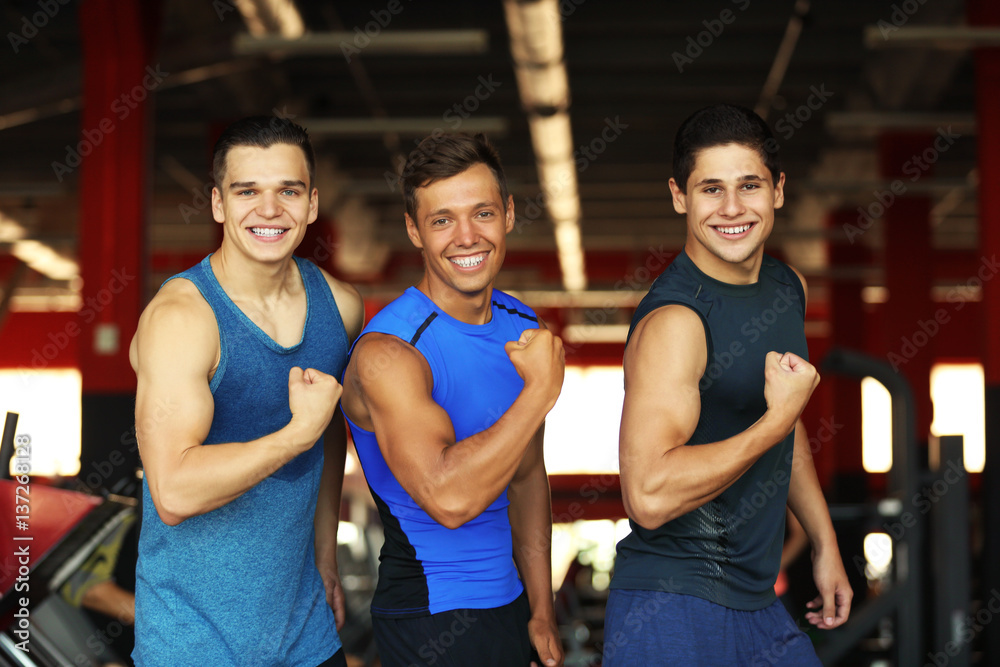 Portrait of athletic men in gym