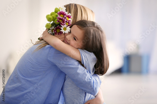 Cute little girl greeting h...