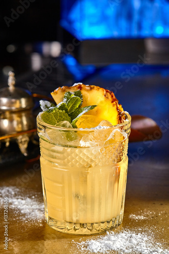 aperitif cocktail with pineapple and mint