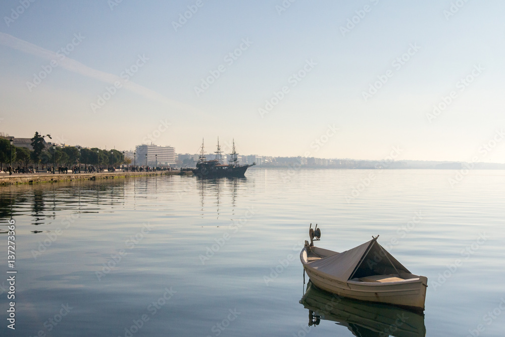 Boats and ships on the Aegean sea on Thessaloniki seafront in Greece.