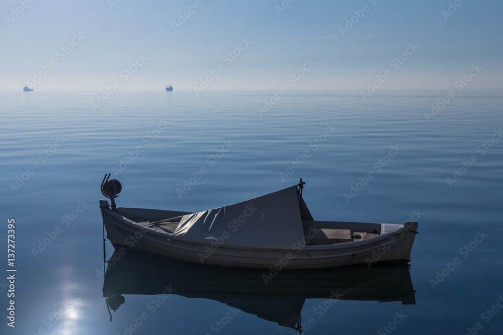 Naklejka premium Boats and ships on the Aegean sea on Thessaloniki seafront in Greece