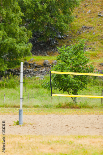 volleyball yellow net and playing court outdoor