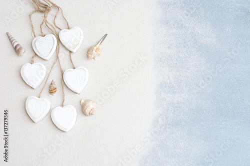 Background with shells , sand and wooden heart © swety76