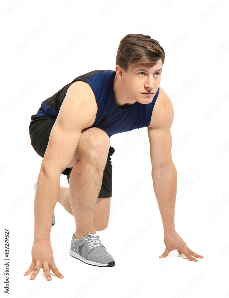 Young handsome sportsman doing exercises on white background Young handsome sportsman doing exercises on white background