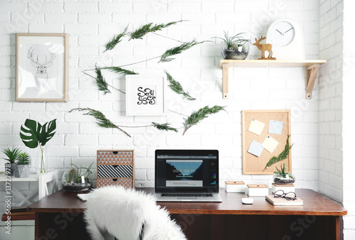 Modern laptop on wooden desk
