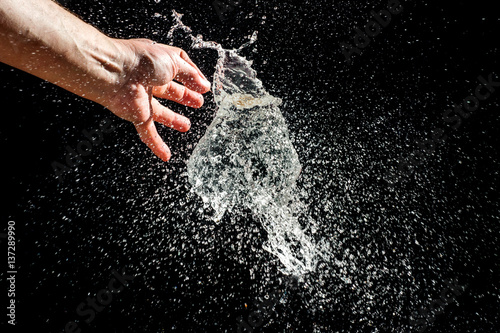 Foto Burst of a balloon filled with water on black background