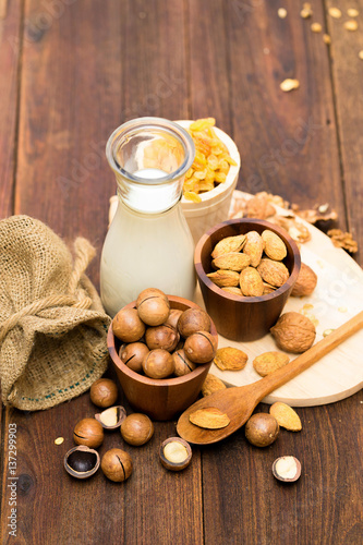 Fototapeta Naklejka Na Ścianę i Meble -  Cereal milk walnuts almonds and macadamia