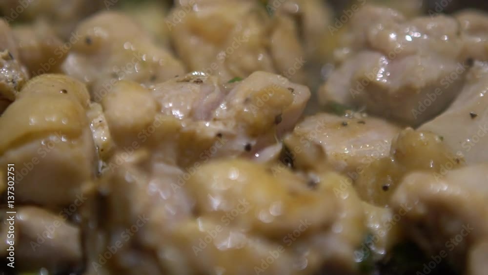 Slow Motion Cuisine a small Piece of chiken. A Chef is Cooking a Raw chiken Meat Steak on the Grill in a kitchen restaurant. Cooked indoors closeup Slow-Motion rate of 120 fps-Dan Slow Motion Cuisine a small Piece of chiken. A Chef is Cooking a Raw chiken Meat Steak on the Grill in a kitchen restaurant. Cooked indoors closeup Slow-Motion rate of 120 fps-Dan