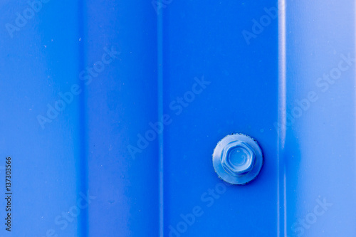 Bolt screwed in blue metal profiled sheet