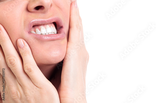 Woman with a toothpain  isolated on white background