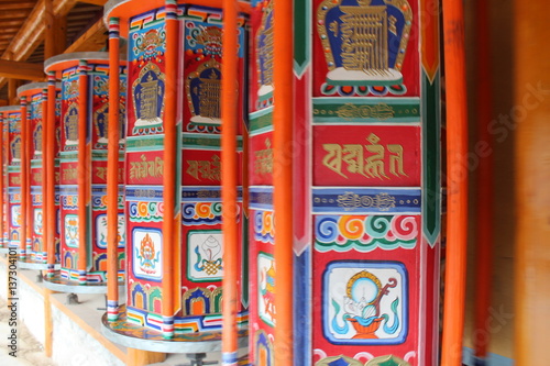 Prayer Wheel Amdo Tibet Tibetan Monastery Labrang China Gansu Xiahe Rainbow Wood Wheels Red Orange Gold Blue Green White Turn