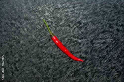 The red color chili represent the vegetable and food ingredient concept related idea.