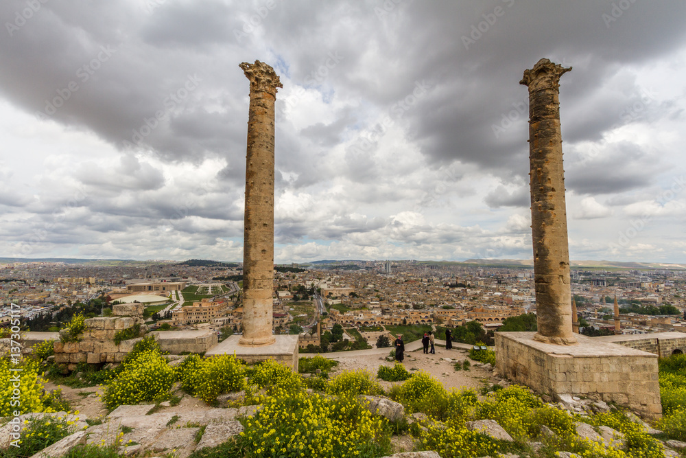 Photo taken from Urfa Castle two pillar, some castle structures and the city is on the picture.