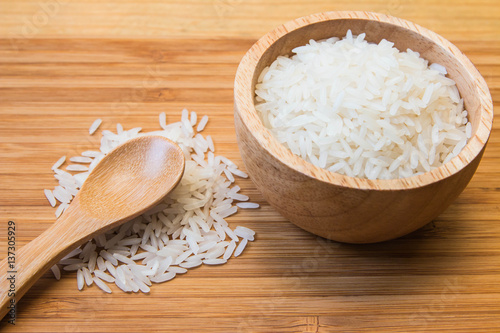 White rice in the wood bowl with wood spoon 2