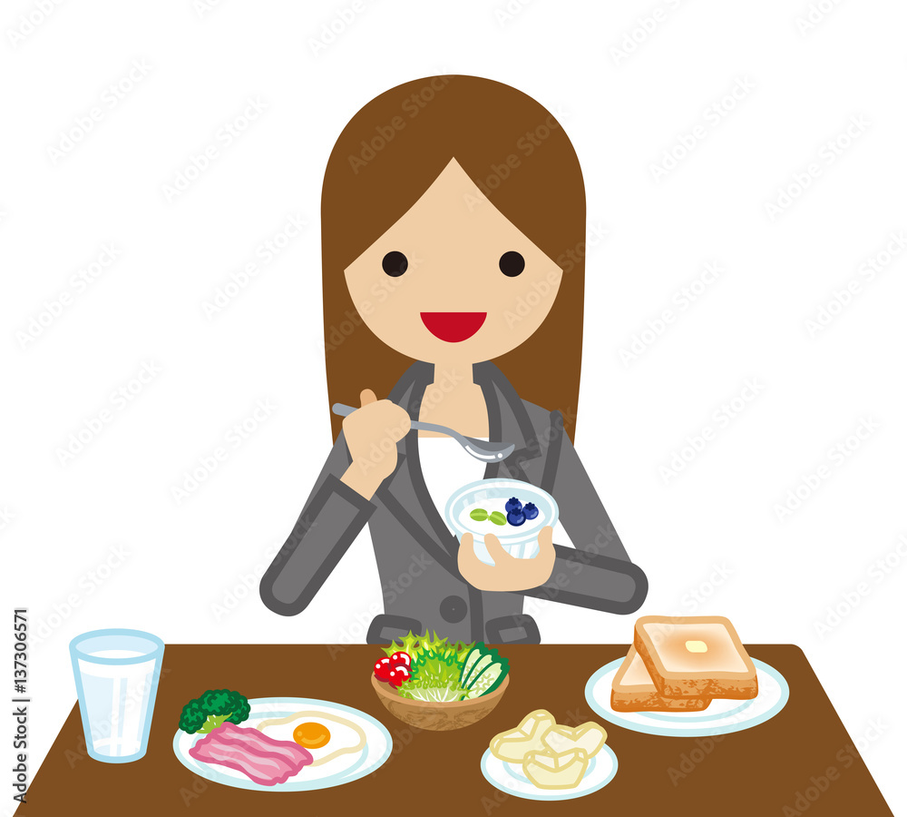 朝食を食べるビジネスウーマン 朝食を食べるビジネスウーマン