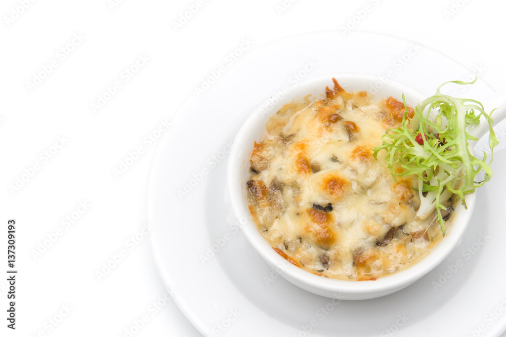 Julienne with chicken and mushrooms in a white bowl Julienne with chicken and mushrooms in a white bowl