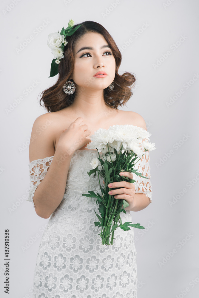 Beautiful asian woman bride on grey background. Beautiful asian woman bride on grey background.