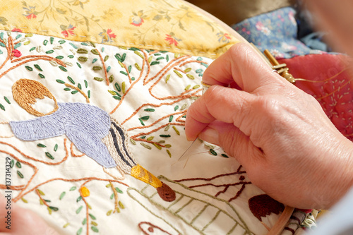 close-up of the hands of a seamstress
