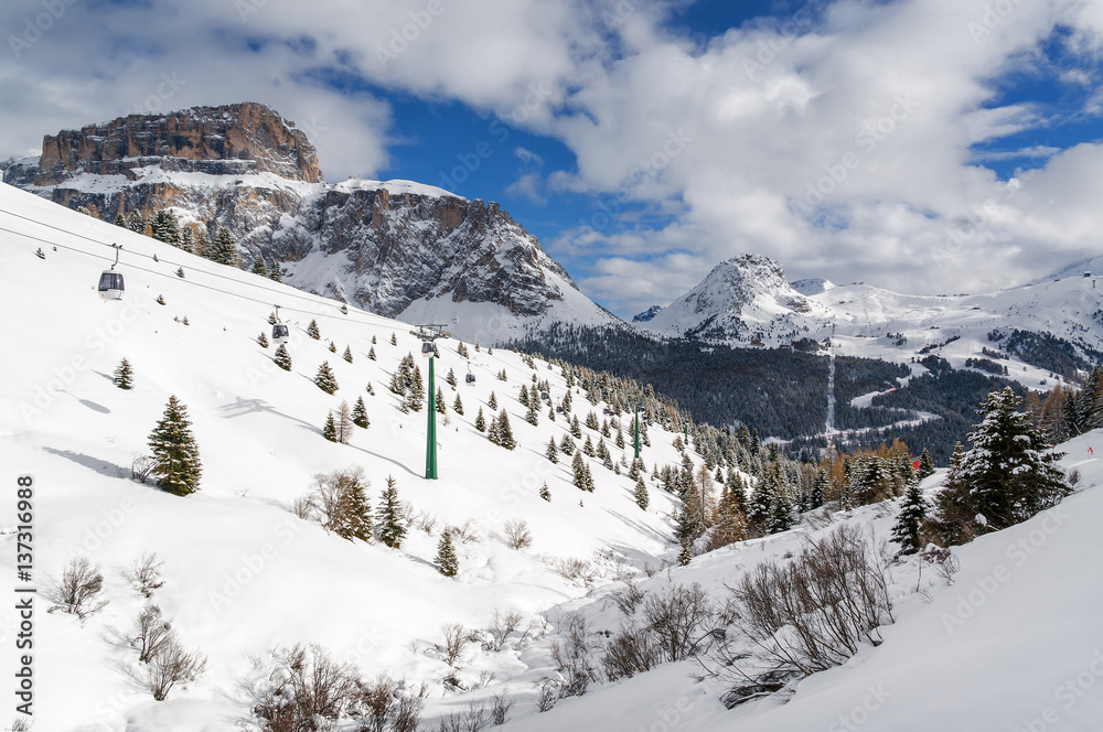 Sunny view of Dolomites from  Belvedere valley near Canazei of Val di Fassa, Trentino-Alto-Adige region, Italy.